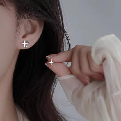 Boucles d’Oreilles Nœud en Acier – Élégance Moderne & Originalité